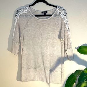 A.Byer Size M cream colored thin sweater with lace detail on shoulders to arms